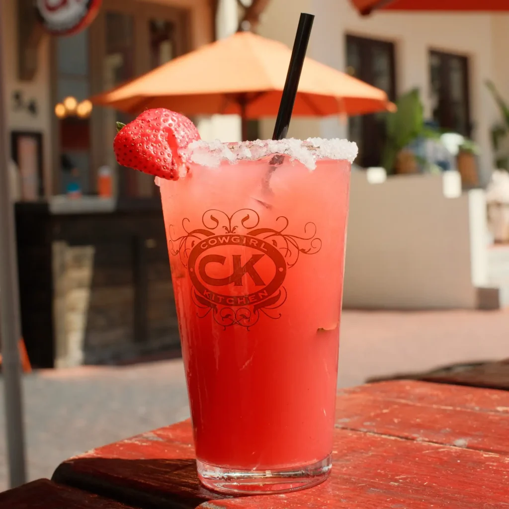 Strawberry cocktail with a sugared rim on the patio at Cowgirl Kitchen in Rosemary Beach