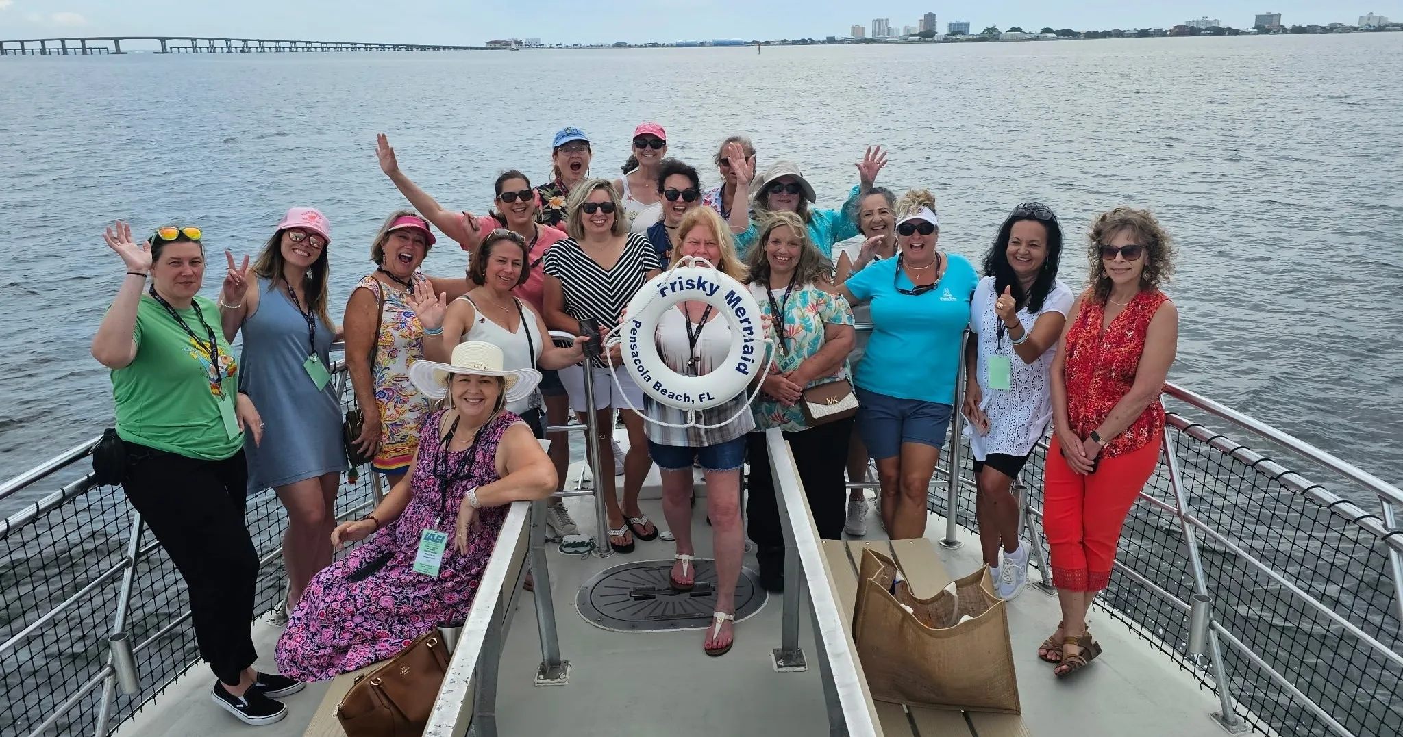 A group aboard the Frisky Mermaid dolphin cruise