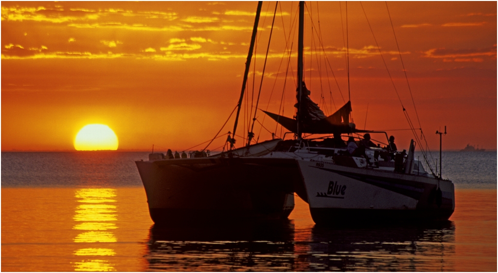 Fleets and Eats - catamaran at sunset
