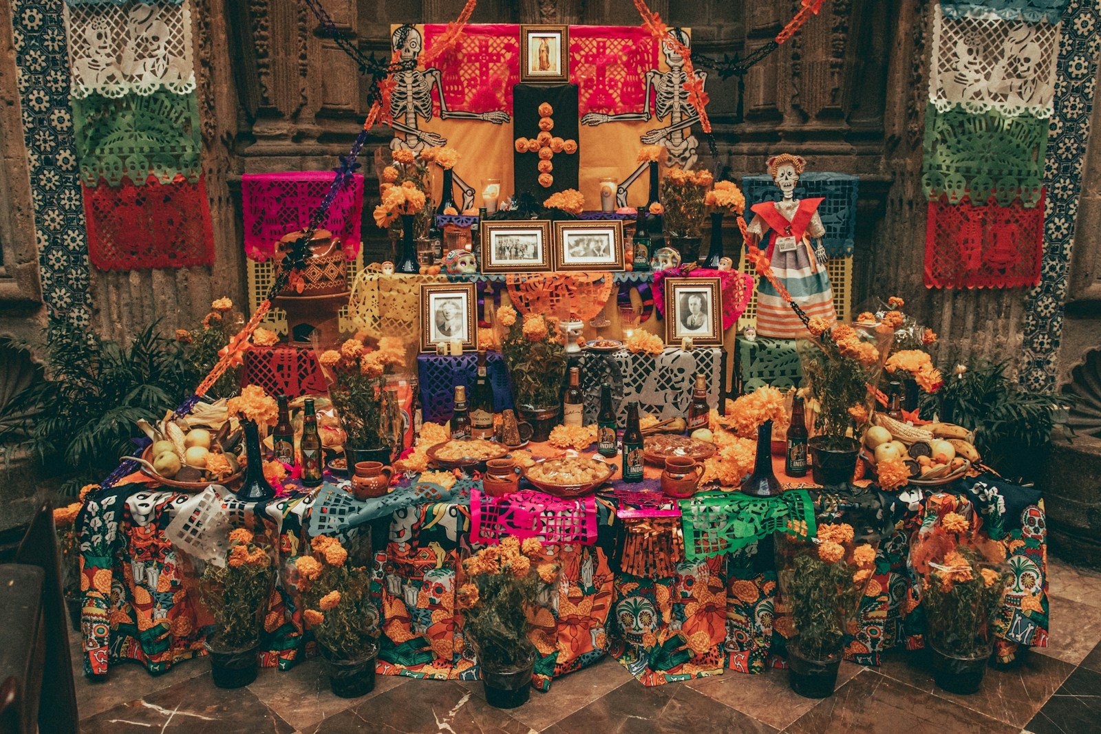 Day of the Dead altar with marigolds and candles
