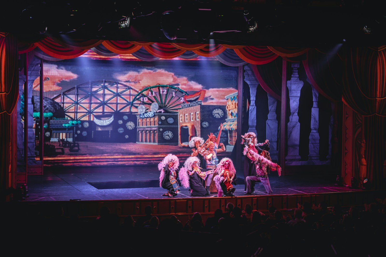Audience watching a stage performance in a theater