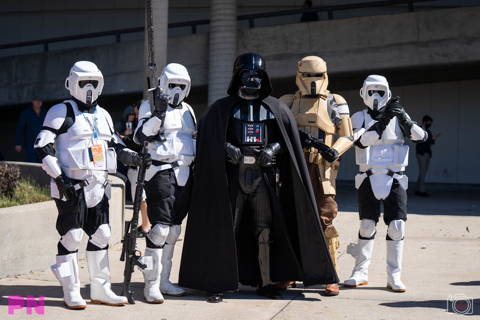 Cosplayers dressed as stormtroopers and Darth Vader at Pensacon