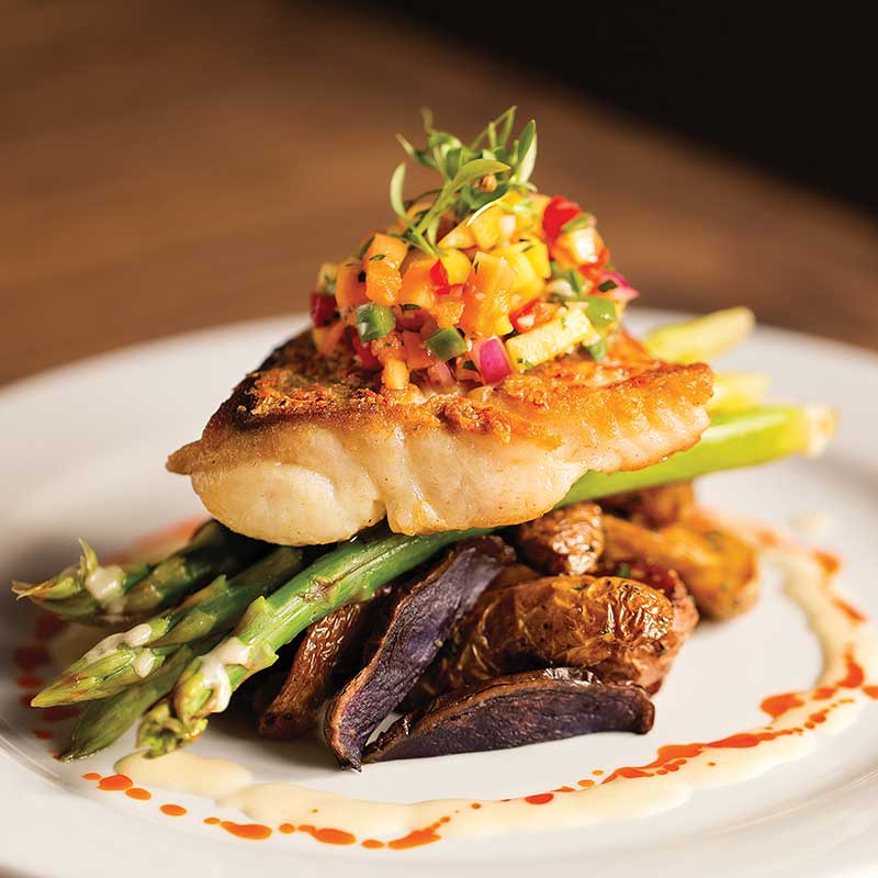Key lime snapper over asparagus and roasted potatoes at Slick Lips Seafood and Oyster House